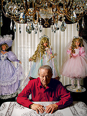 Mr. Snelius with his wife's dolls